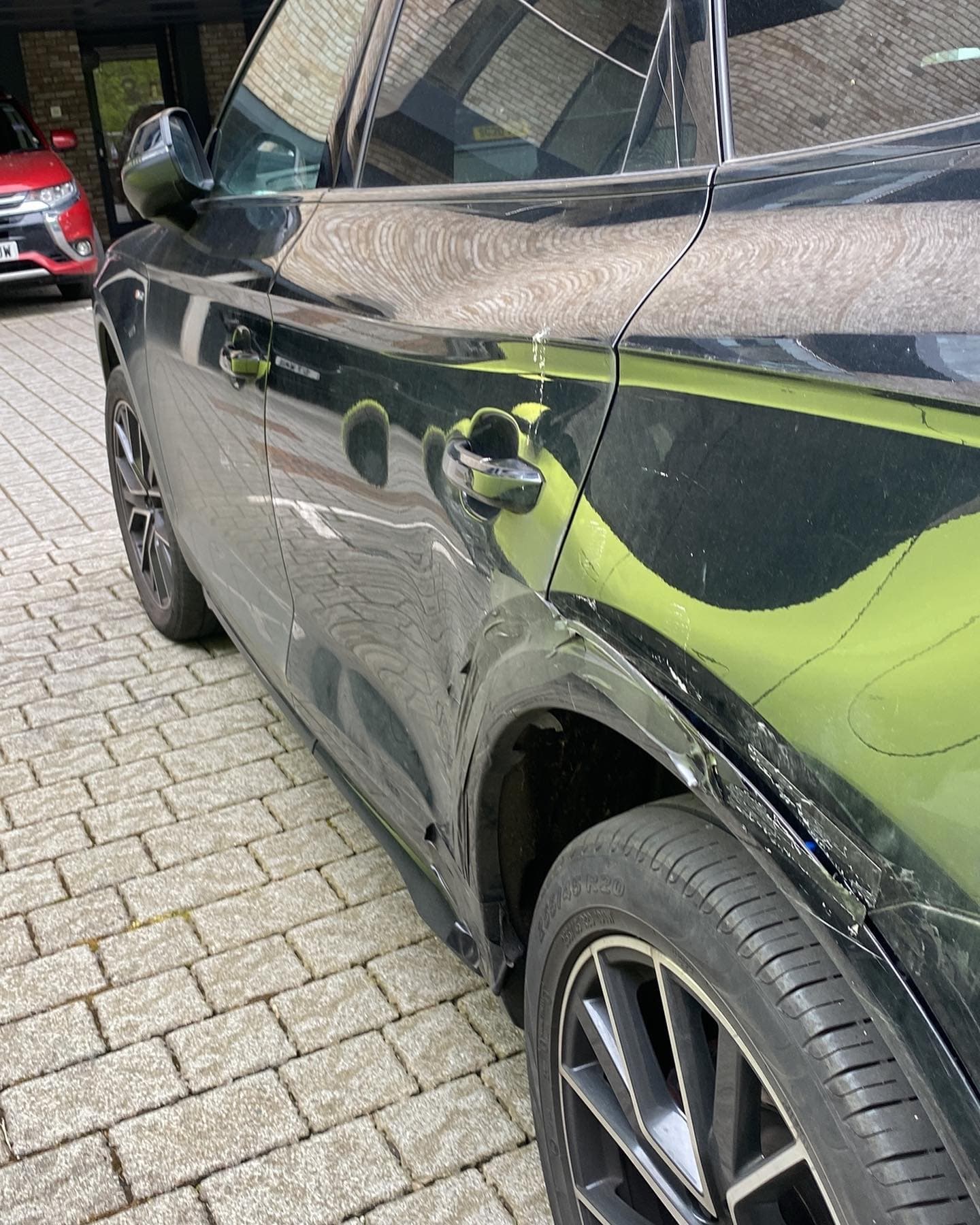 Car door damage before repair